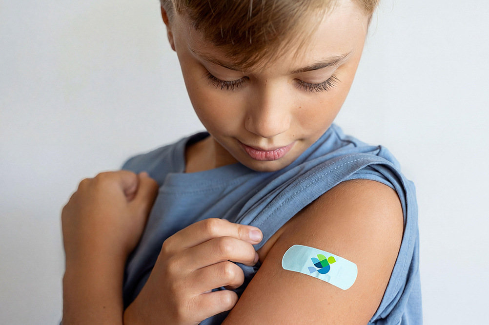 Christ Health child with bandaid.