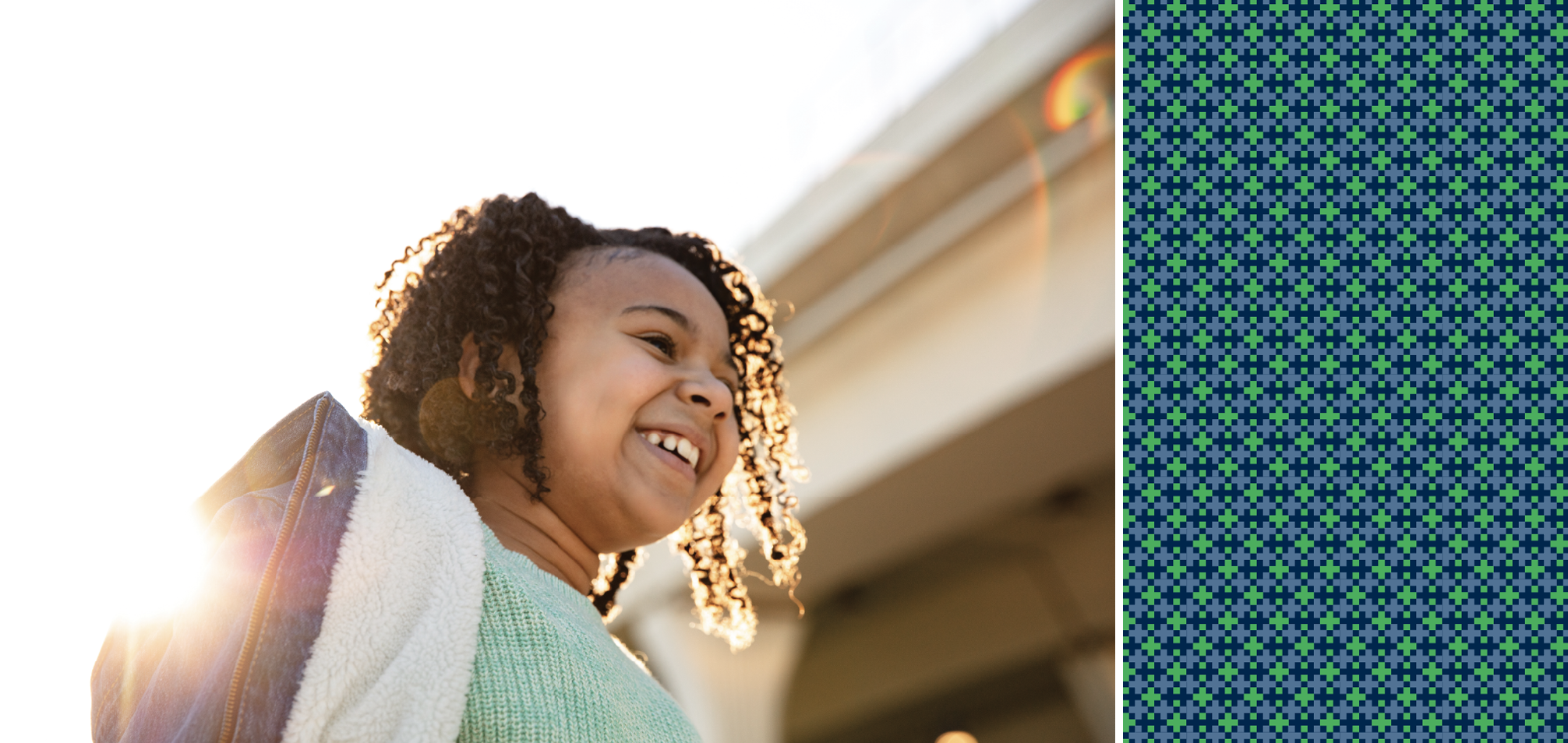 Christ Health girl smiling under bridge.